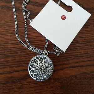 Silver Pendant Necklace featuring Floral Design